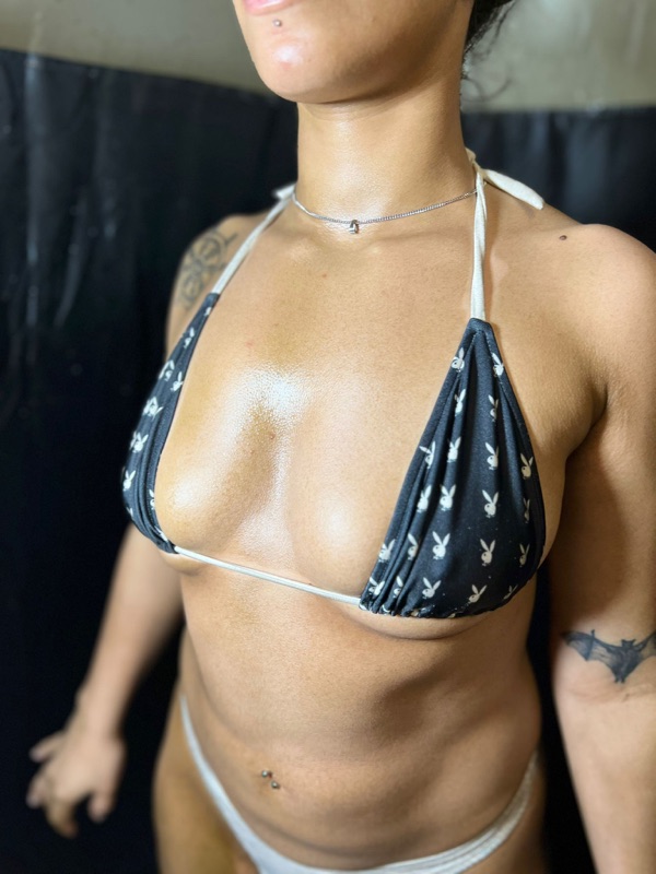 Client-submitted photo of an even, bronze Signature Custom spray tan result